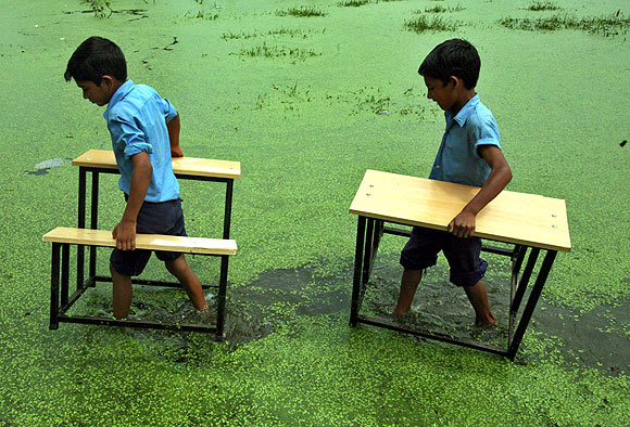 IN PHOTOS: Getting to school at ALL COSTS