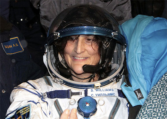 Sunita Williams smiles after landing near the town of Arkalyk, in northern Kazakhstan