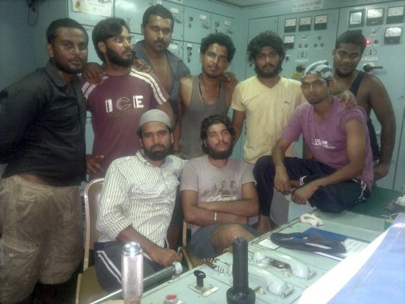 Rakesh Kumar with other crewmen on board Royal Grace while being held hostage