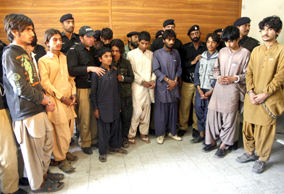 A militant gang, arrested by the police, in Quetta