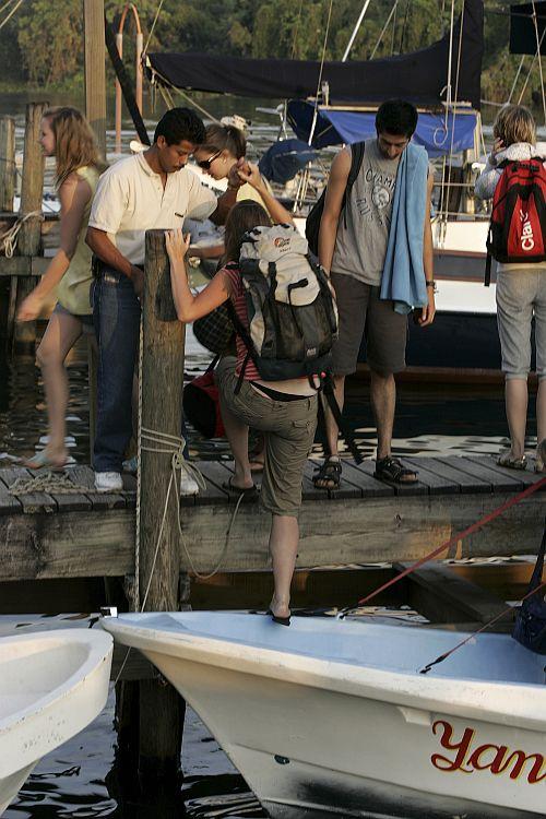 Tourists arrive in Rio Dulce, Guatemala