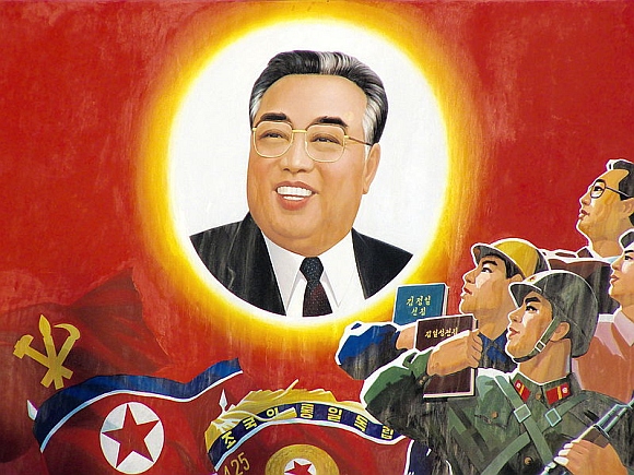 Wall paintings like this, extolling Kim Il Sung, are found in every city, town and village in the country. Major monuments aside, they are the only things that are illuminated at night, there are street lamps, but they are never switched on.