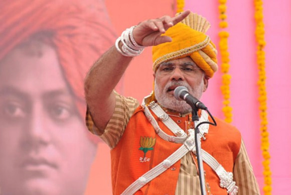 Modi addresses his supporters during a rally in Dahod district