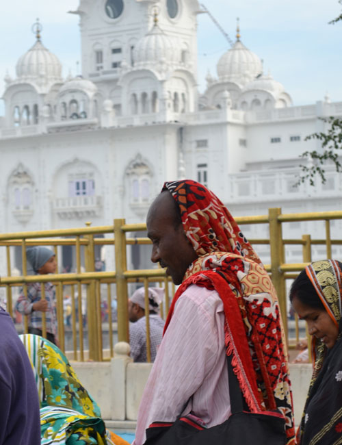 A group of Bengali tourists take in their first sight of the Golden Temple