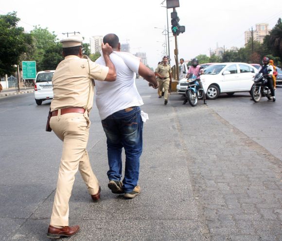 Police arrests a man causing disruption during Thursday's Thane bandh
