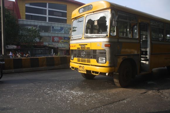 Another damaged private bus seen in bandh-hit Thane