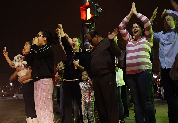PICS: Jubilant Bostonians celebrate after suspect