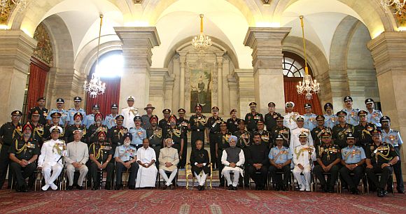 President Pranab Mukherjee, Vice President Hamid Ansari, Prime Minister Manmohan Singh, Defence Minister A K Antony, Minister of State for Defence, Jitendra Singh and other dignitaries at the Defence Investiture Ceremony