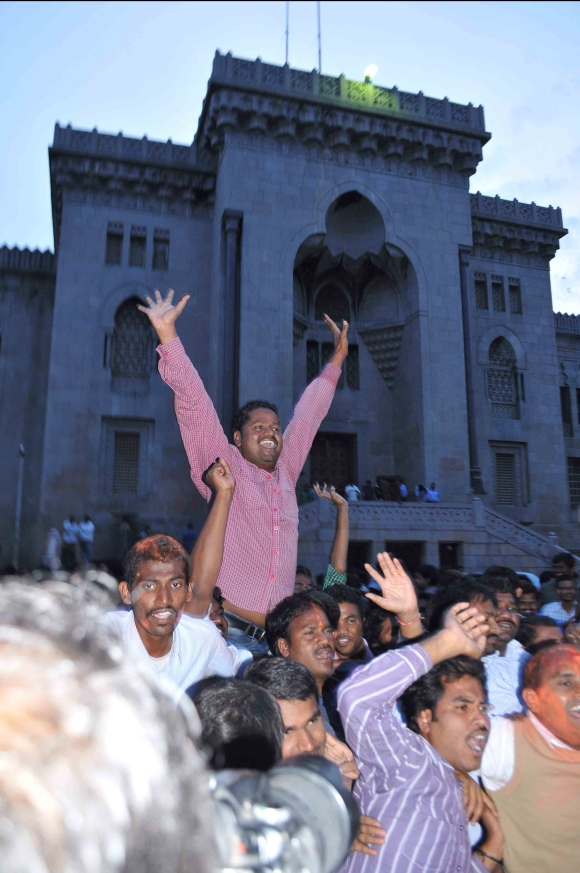 Telangana supporters celebrate after UPA annouced statehood for the region