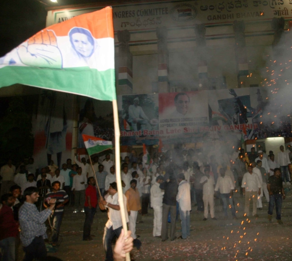 Congress workers burst firecrackers after the division of Andhra Pradesh 
