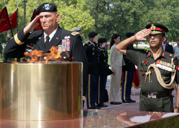 US Army Chief General Raymond Odierno saluting at the Amar Jawan Jyoti in New Delhi