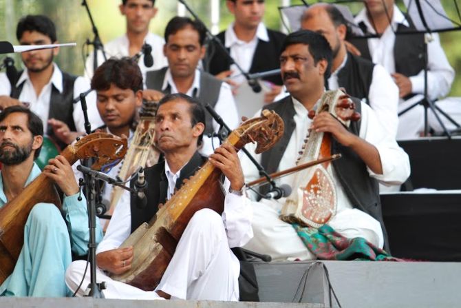 Kashmiri musicians performing with Zubin Mehta's assemblage at Srinagar's Shalimar Bagh