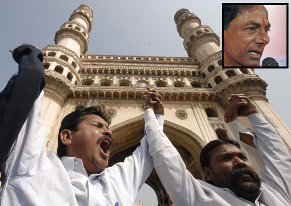 Activists shout slogans as they form a human chain during a protest in front of the Charminar in Hyderaba. (Inset:Telangana Rastra Samithi chief K Chandrasekara Rao) 
