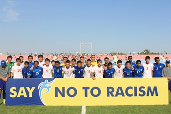 The India and Tajikistan team pose for a photograph before the matc