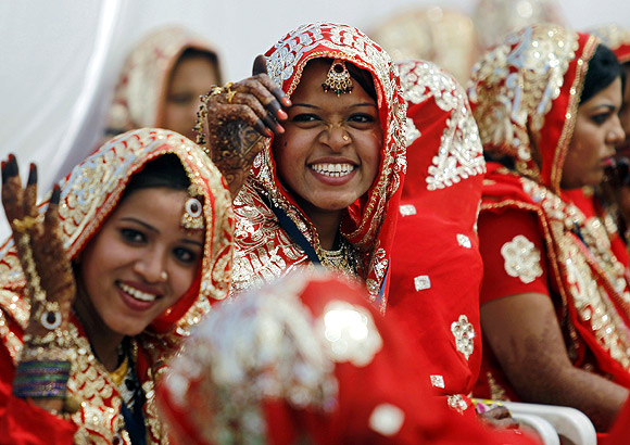Muslim brides at a mass marriage ceremony in Ahmedabad.