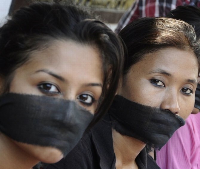 Photojournalists protest against the Mumbai gang rape in Guwahati