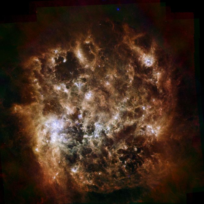 The Large Magellanic Cloud galaxy in infrared light seen by the Herschel Space Observatory and NASA's Spitzer Space Telescope