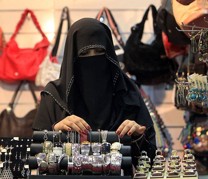 A vendor arranges jewellery at Abha Festival in Saudi Arabia