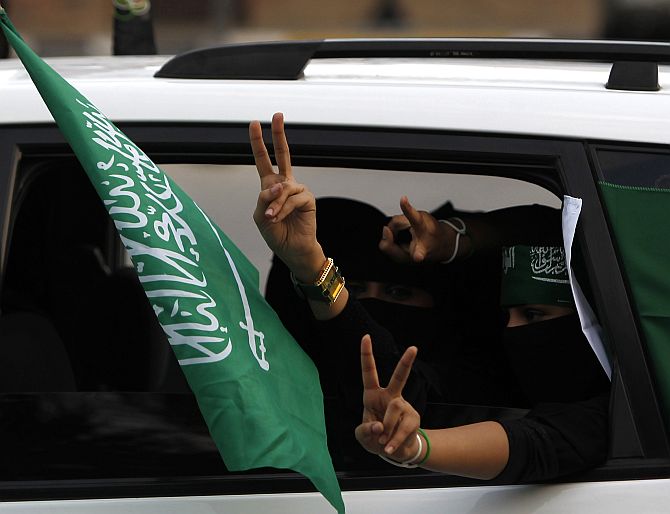 Saudi veiled women celebrate the country's National Day in Riyadh