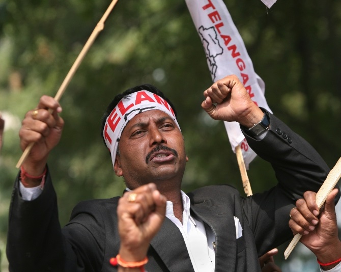 A pro-Telangana supporter shouts slogans during a protest in New Delhi