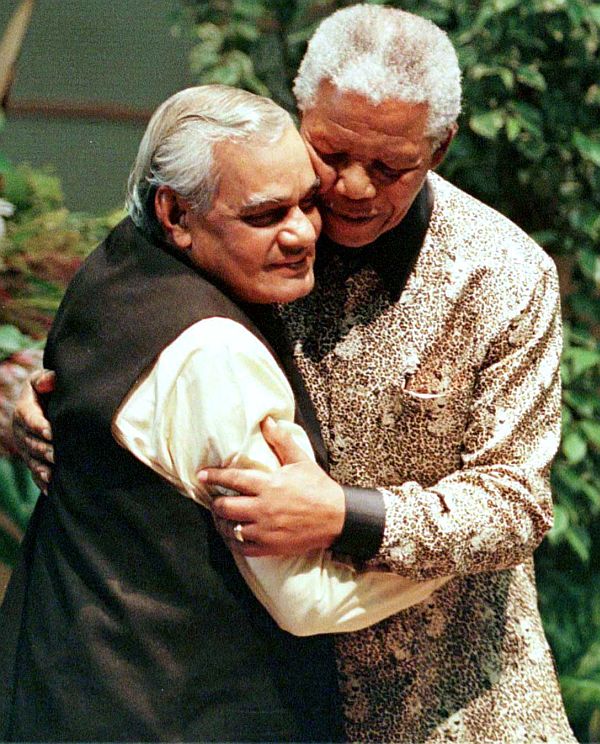 Here Mandela is seen embracing then Indian Prime Minister Atal Behari Vajpayee during the Non-Aligned Movement Summit in Durban