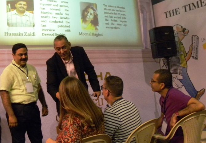 Rakesh Maria greets journalists and writers Adrian Levy and Cathy Scott-Clark, who wrote The Seige, during the event in Mumbai. At his right is banker and author Ravi Subramanian.