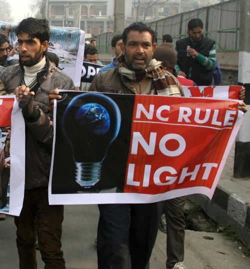 A protestor demonstrates against power woes in Srinagar