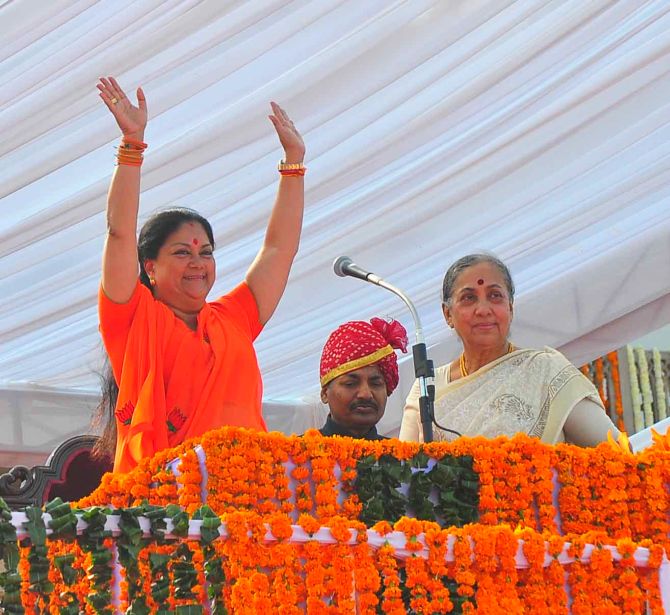 Vashundhara Raje waves to the crowd during her swearing-in ceremony as Rajasthan's CM, in Jaipur on Friday