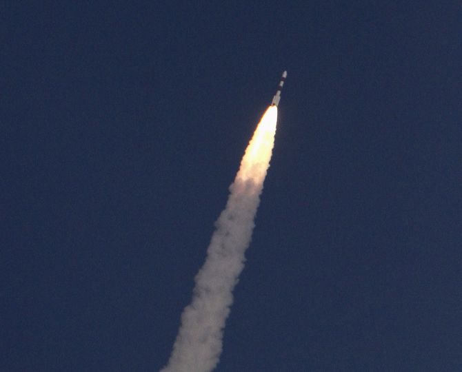 India's Polar Satellite Launch Vehicle, carrying the Mars orbiter, lifts off from the Satish Dhawan Space Centre in Sriharikota.