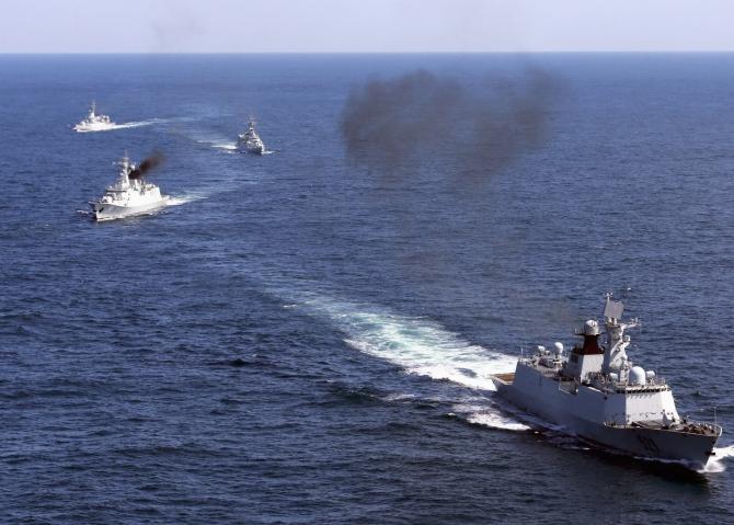 Chinese vessels roam the waters of East China Sea during a naval drill