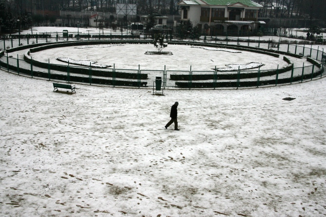 PHOTOS: Srinagar receives season's first snowfall