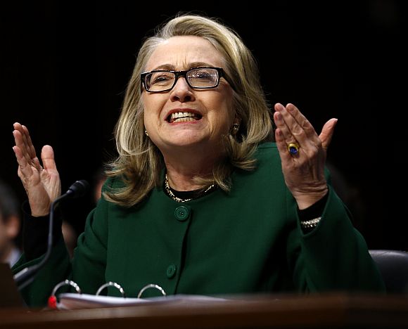 Hillary Clinton responds forcefully to intense questioning on the September attacks on US diplomatic sites in Benghazi, Libya, during a Senate Foreign Relations Committee hearing on Capitol Hill in Washington