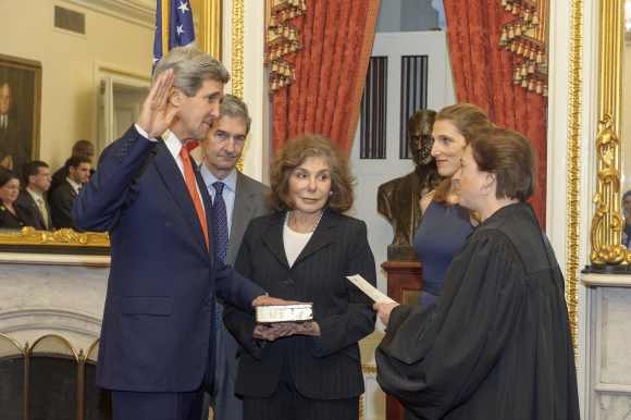 Former Senator and chairman of the Senate Foreign Relations Committee John Kerry is officially sworn-in as secretary of state as his wife, Teresa Heinz Kerry looks on