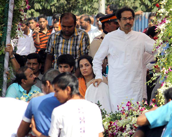 Uddhav Thackeray, his wife Rashmi and other members of the Thackeray clan accompany Shiv Sena leader Bal Thackeray on his final journey.