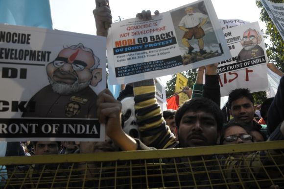 Detractors of Gujarat Chief Minister Narendra Modi protest outside the Sri Ram College of Commerce.