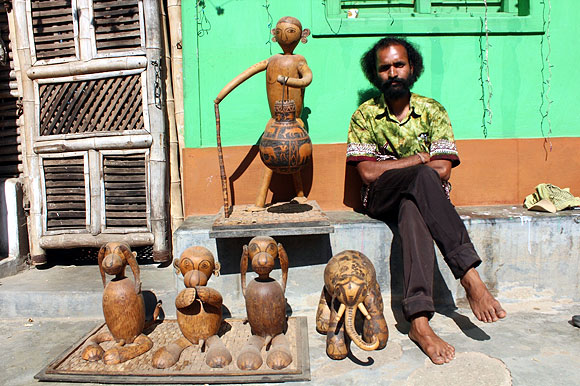 Jagat Ram uses bottle gourd to make lampshades.