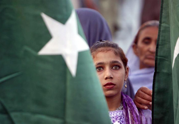 A girl attends a rally in Islamabad