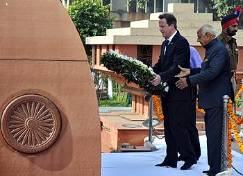 Then British prime minister David Cameron places a wreath at the Jallianwala Bagh memorial, February 23, 2013. Photograph: Munish Sharma/Reuters