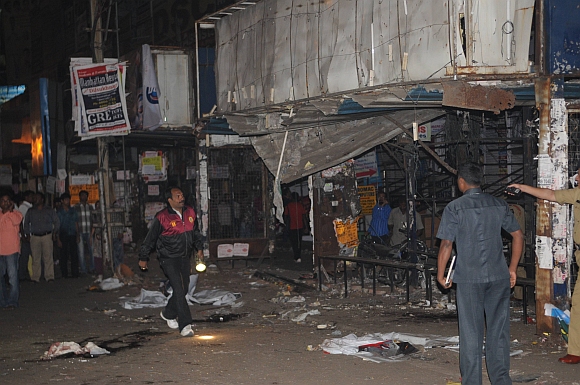 Investigators at the blast site at Dilsukhnagar in Hyderabad