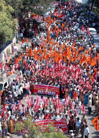 Trade union workers marching in a rally during the two-day strike in Hyderabad
