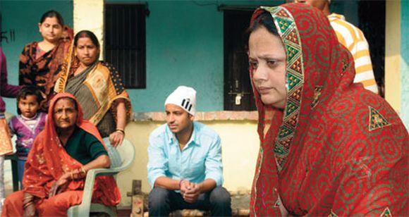 Husband of Mukhiya Poonam Devi (extreme right) was killed in 2011