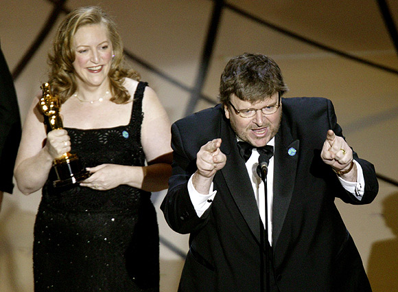 Film director Michael Moore makes an anti-war statement after he accepts his award on  March 23, 2003