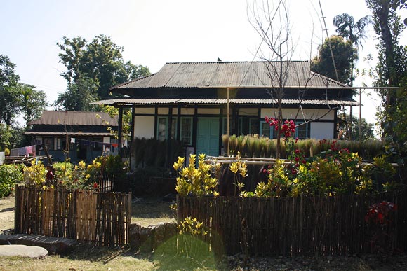 A home in the village, most homes have a garden.