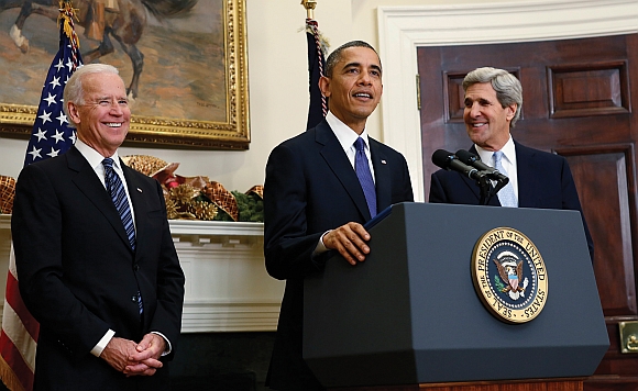 President Barack Obama announces his nomination of US Senator John Kerry, (right), to succeed Hillary Clinton as Secretary of State, while Vice President Joe Biden looks on