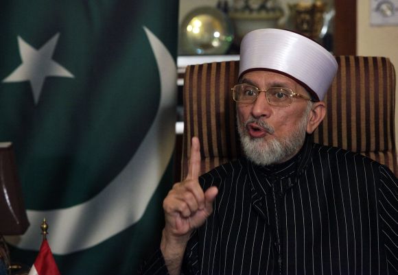 Dr Qadri speaks during an interview in Lahore