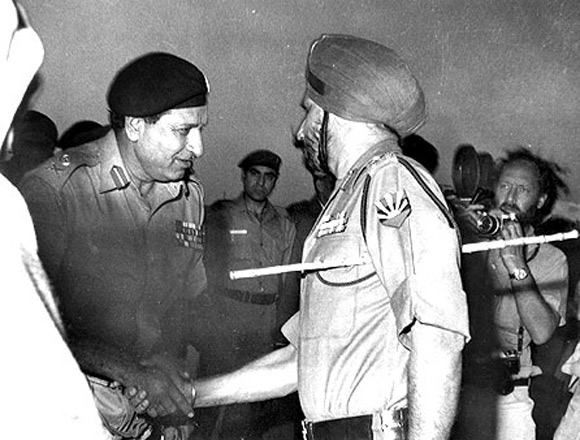 The image that haunts the Pakistan army: Pakistan Lieutenant General A A K Niazi, left, with Lieutenant General Jagjit Singh Aurora, General Officer Commanding-in-Chief, Eastern Command, after Pakistani forces surrendered in Dhaka, December 16, 1971.