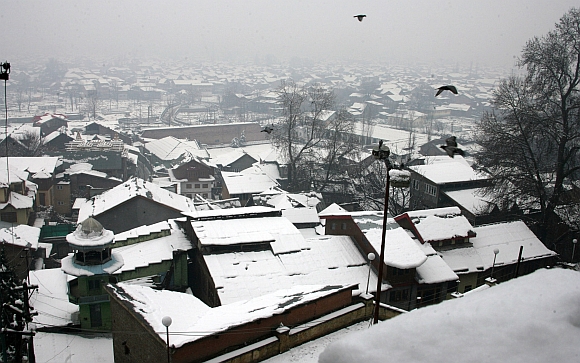 A view of the snow covered Srinagar city after the heavy snowfall