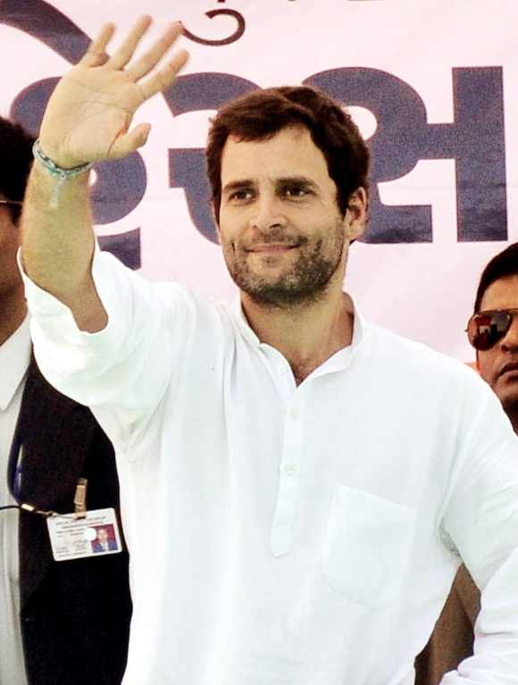 Rahul waves to his supporters during a rally