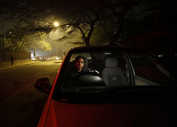 Chandani inside her car on a street in New Delhi