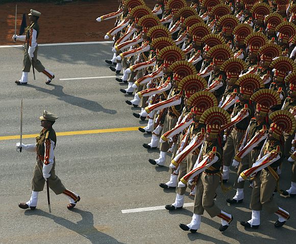 Soldiers march during the full dress rehearsal for the Republic Day parade